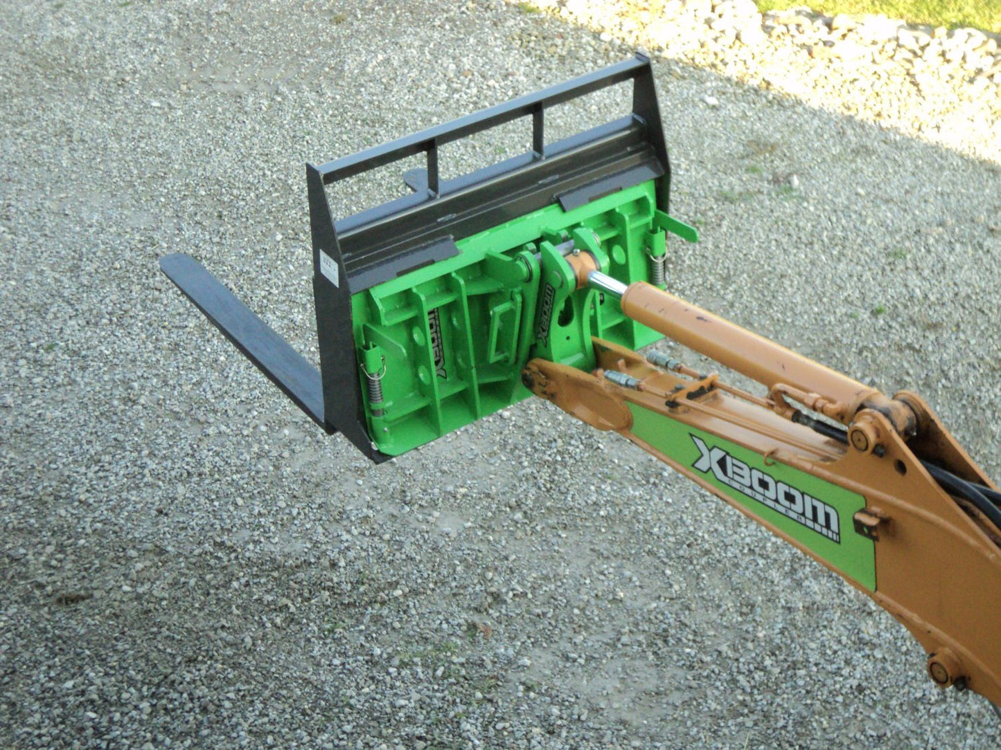 Amulet Manufacturing XBoom Ecavator to Skid Steer Coupler System