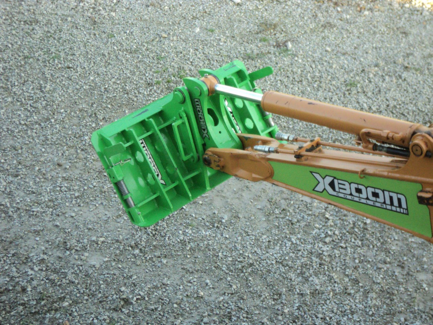 Amulet Manufacturing XBoom Ecavator to Skid Steer Coupler System