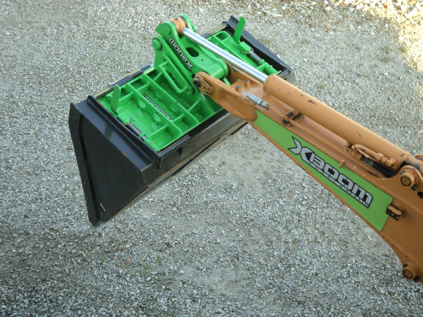 Amulet Manufacturing XBoom Ecavator to Skid Steer Coupler System