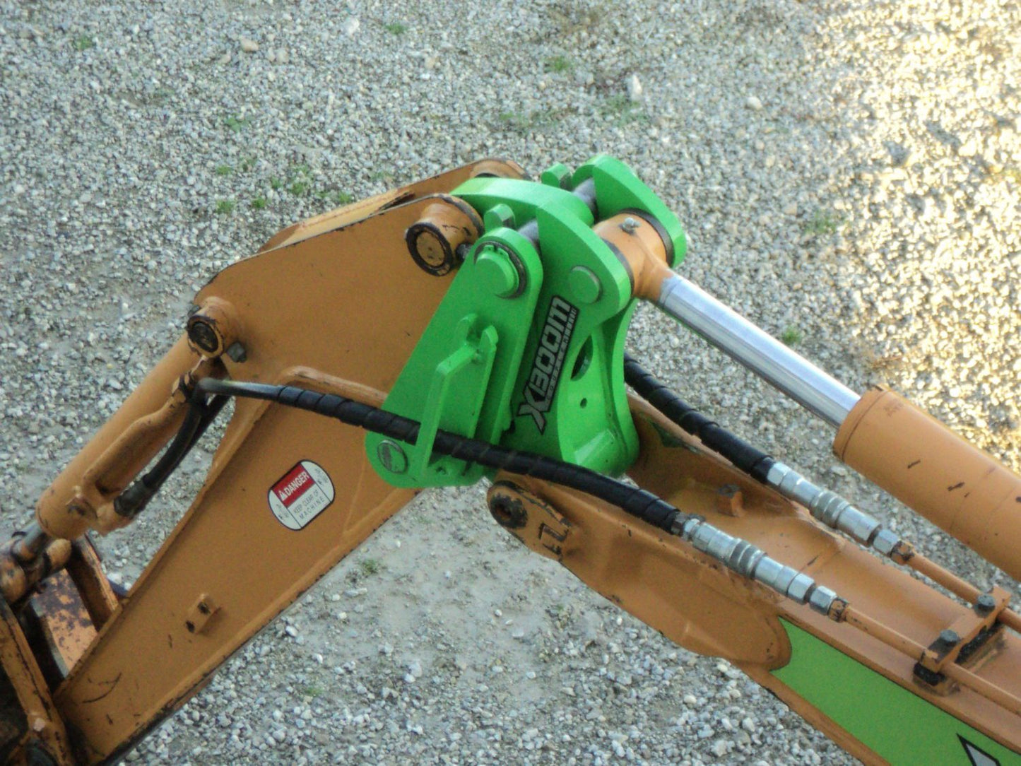 Amulet Manufacturing XBoom Ecavator to Skid Steer Coupler System
