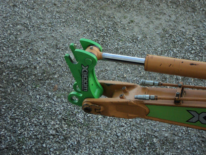 Amulet Manufacturing XBoom Ecavator to Skid Steer Coupler System