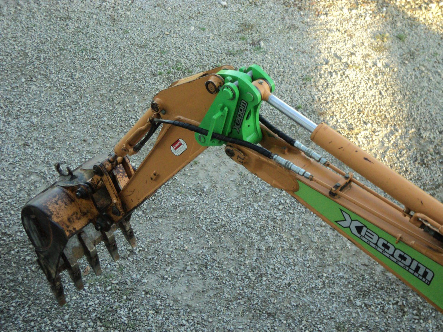 Amulet Manufacturing XBoom Ecavator to Skid Steer Coupler System